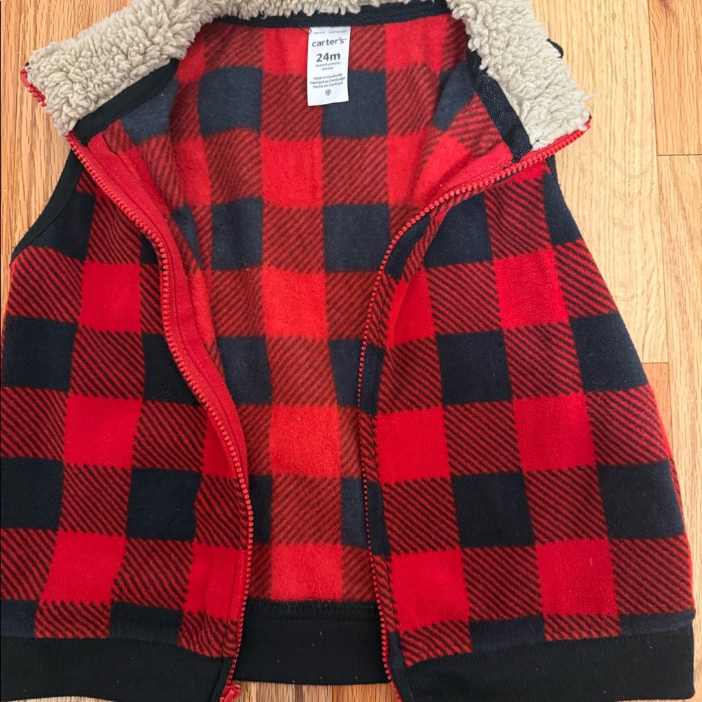 Baby boy vest and onesie.